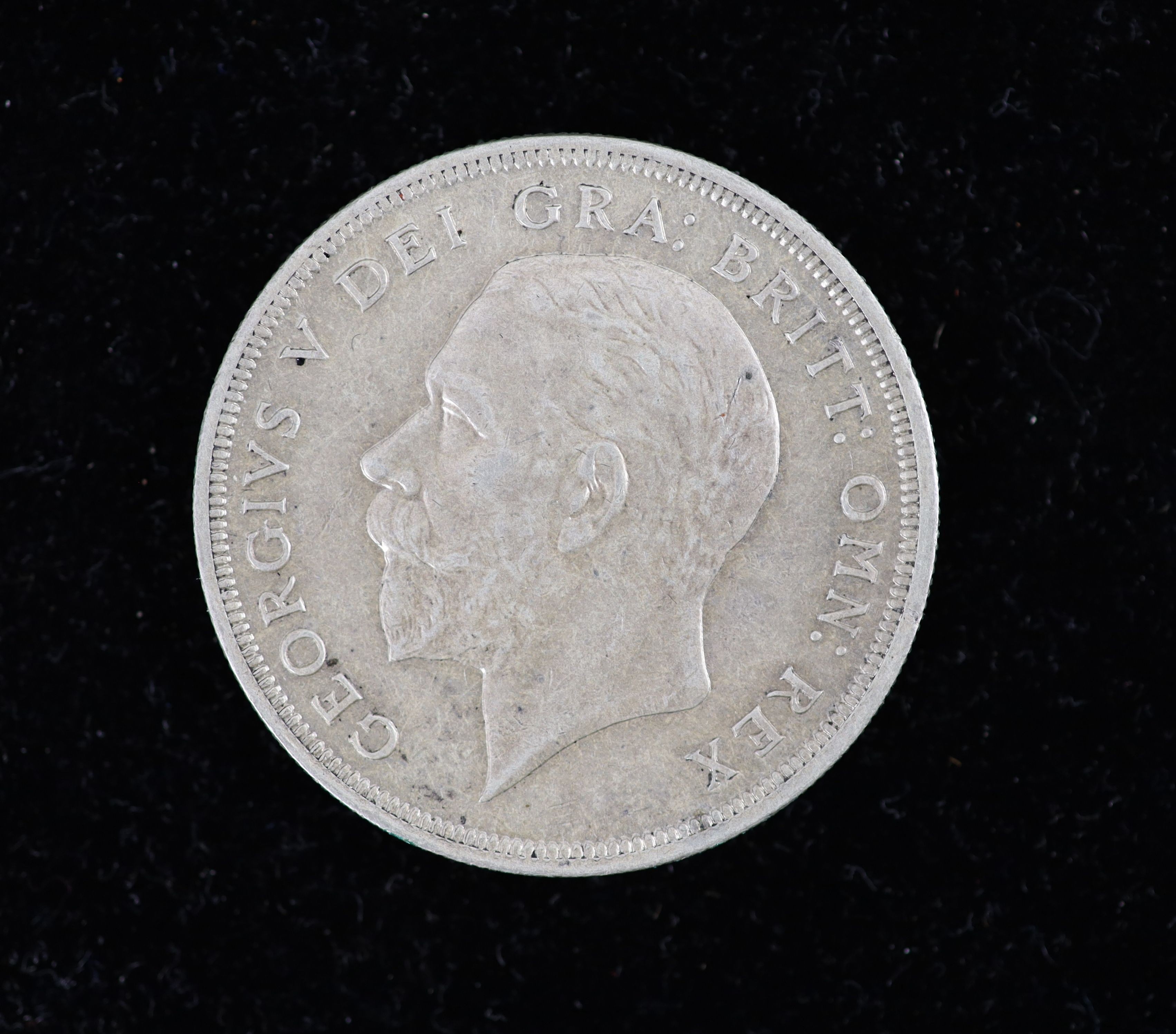 A George V specimen set of eight coins, 1929, fourth coinage, comprising Crown, (S4036), cleaned otherwise about EF, halfcrown to threepence, cleaned otherwise about EF, penny to farthing, toned and lustrous UNC